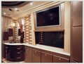 Custom bedroom with TV and vanity